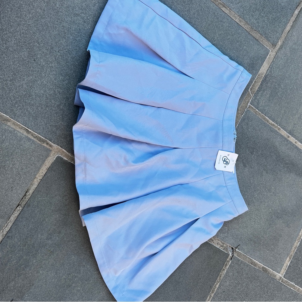 blue skater skort with tag BRAND NEW